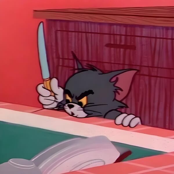 Ảnh meme mèo Tom cầm dao trừng mắt