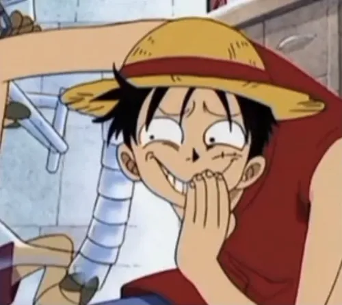 Meme Luffy kéo giãn trêu Jinbe rồi bật cười vang đầy hồn nhiên.